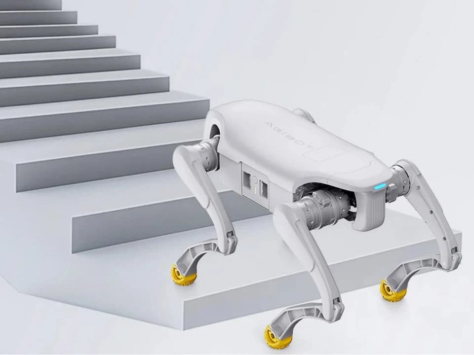 AGIBOT manufacturer illustration of the D1 quadruped platform on grey steps