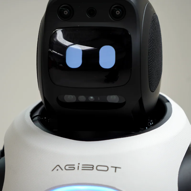 Close-up of the AGIBOT X2 expressive display face and camera array