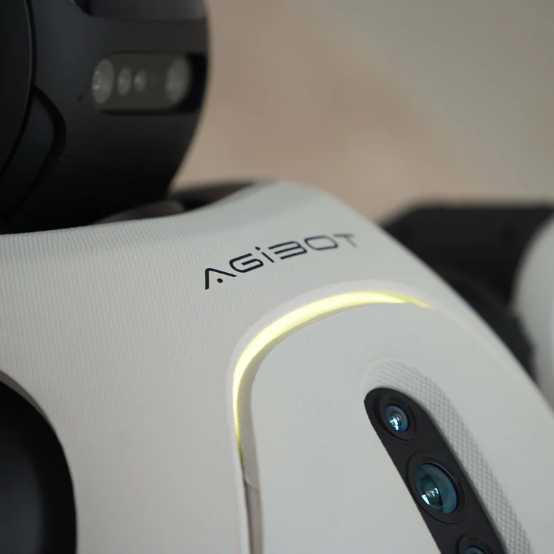 Close-up of the AGIBOT X2 chest camera array and status light