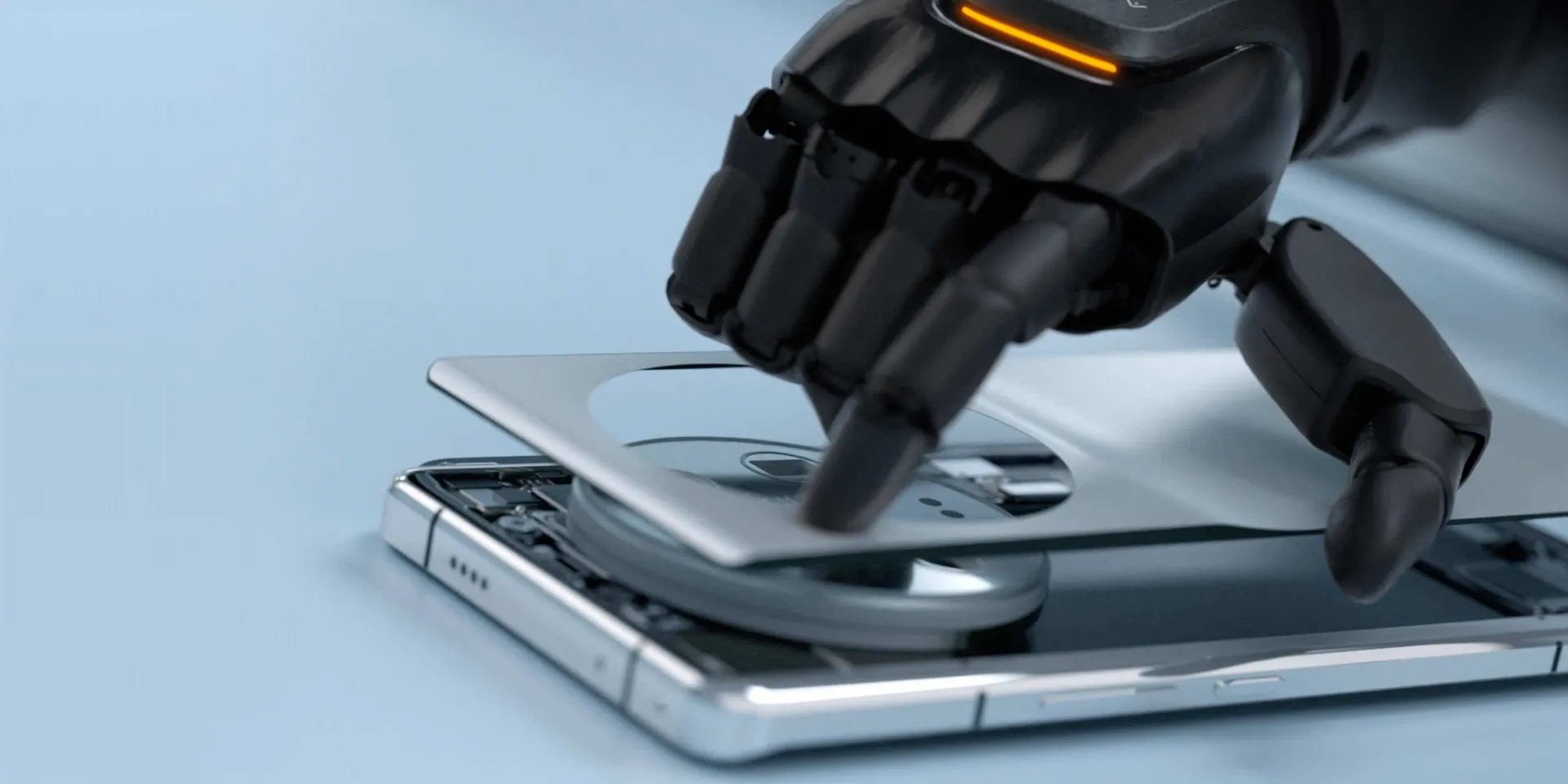Close-up of the AGIBOT G2 hand picking up a smartphone